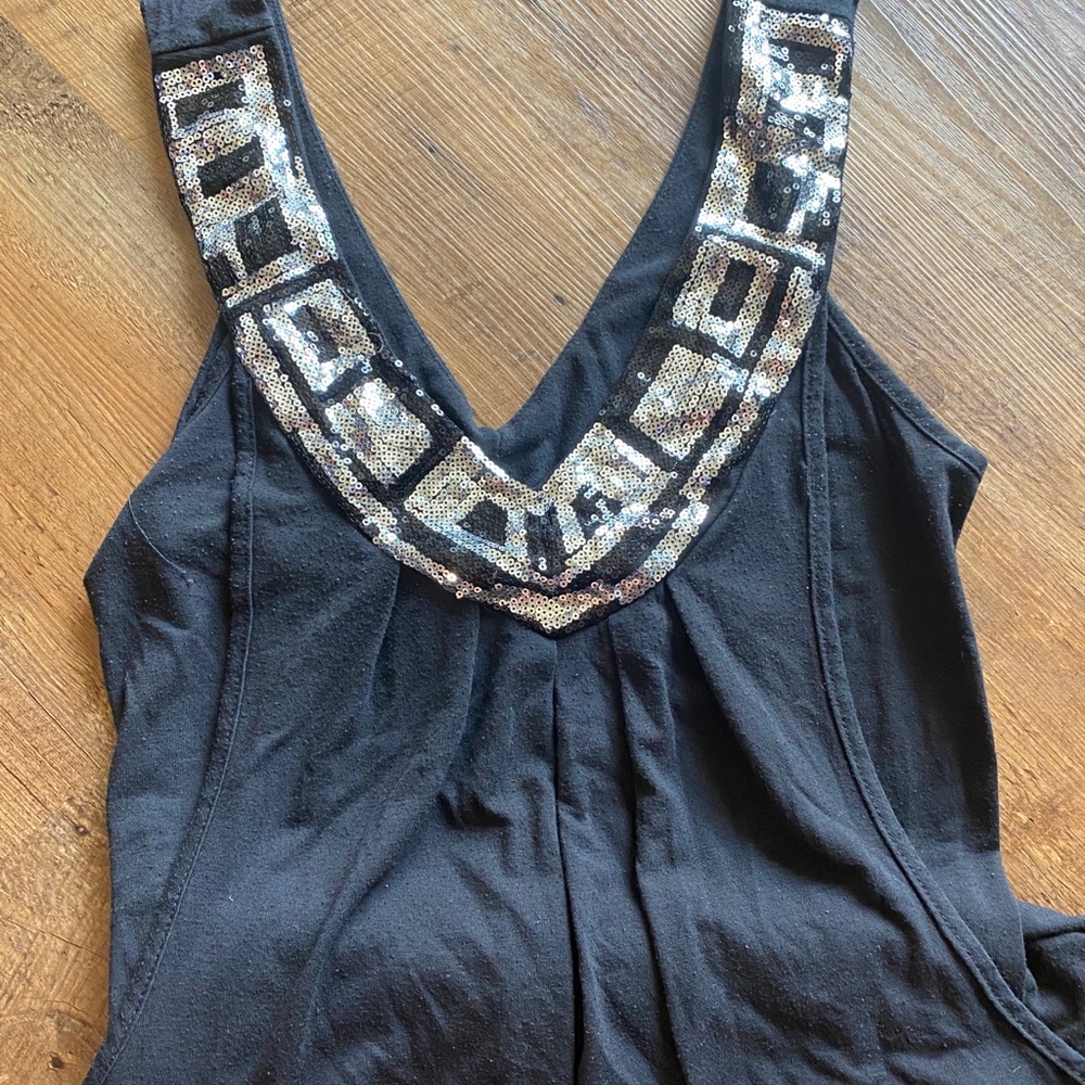 Black tank with sparkly tribal like design